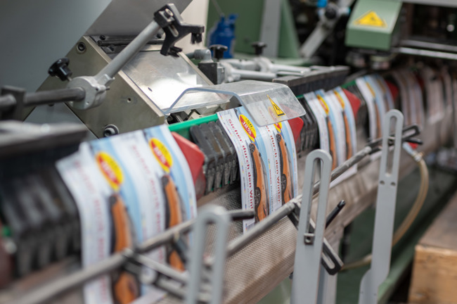 Einblick auf den Sammelhefter im Finishing. Einblick auf den Sammelhefter im Finishing.